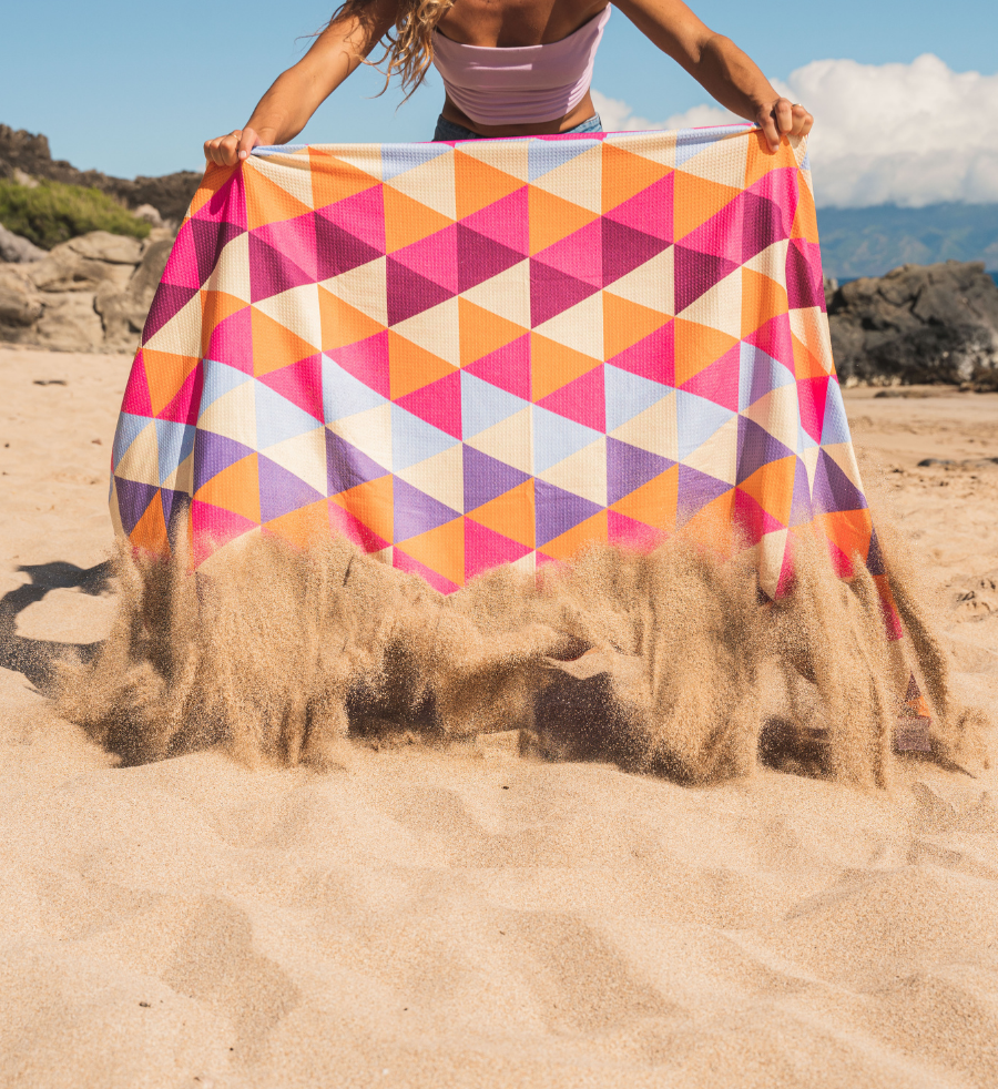 een strandhanddoek zandvrij door de speciale vezel van Buvanha